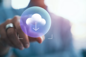 Person tapping on a virtual cloud download icon on a transparent screen.